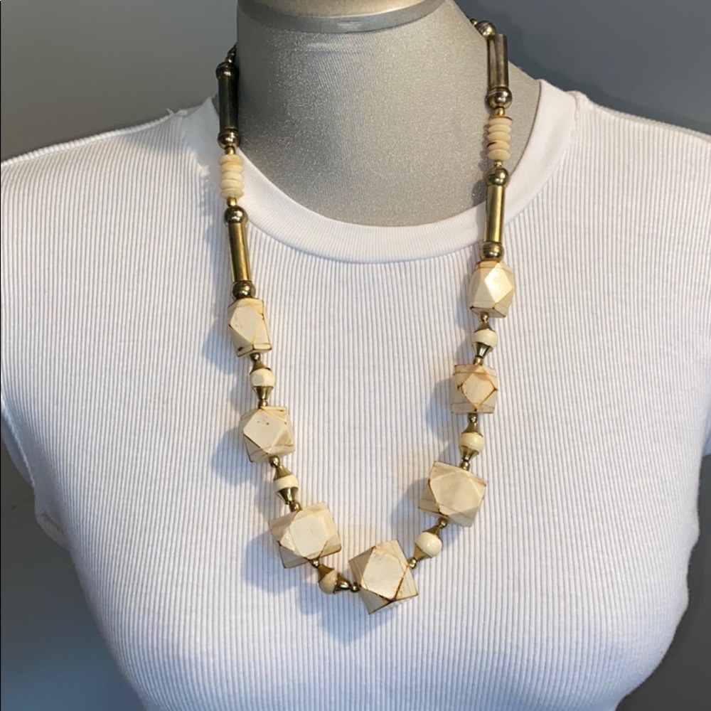 Vintage cream wood bead and brass necklace.